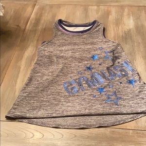 A tank top that says gymnast